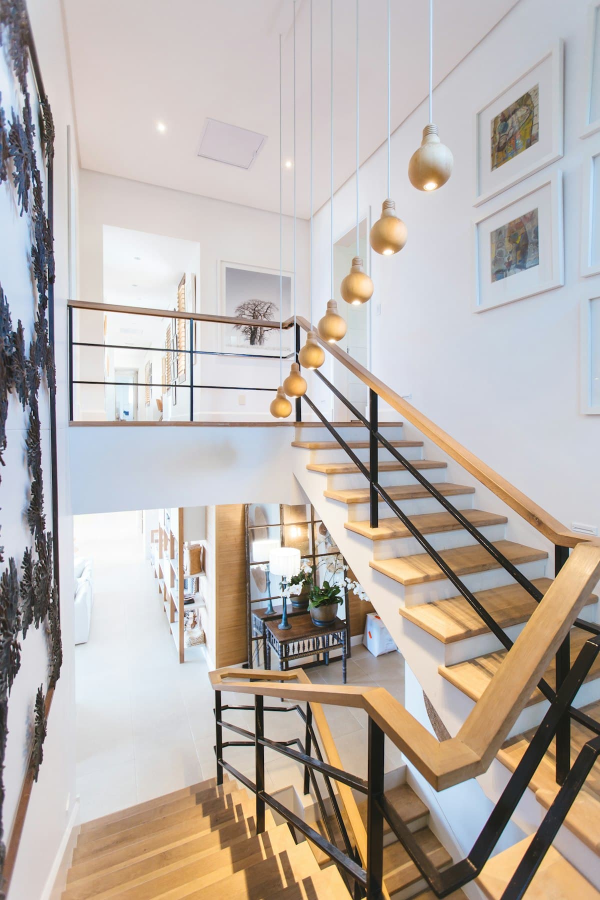 Bright interior fit-out with timber staircase, balustrade and pendant lighting