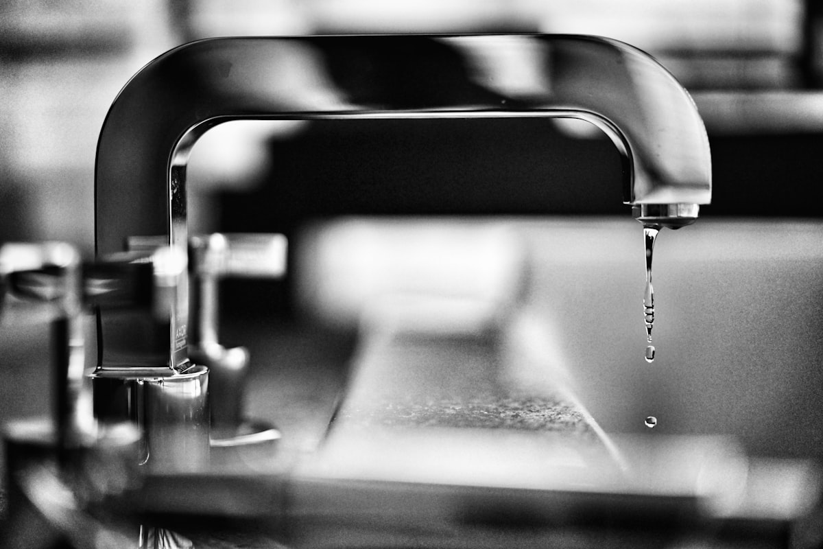 Detail of a polished sanitary fitting following a plumbing installation